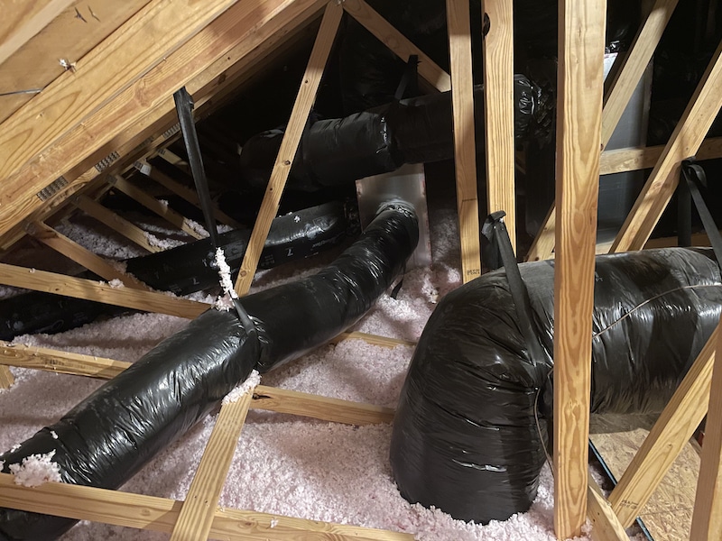 Flexible ductwork in the attic of a house in Florida