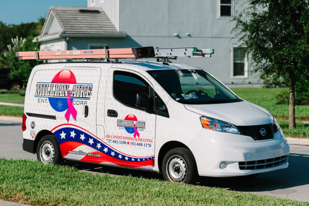 Millian Aire truck pulling up to a customer's house to inspect their heating system and check for a burning smell