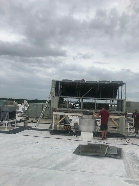 Working on installing a commercial hvac on the roof of this building in Hudson Florida